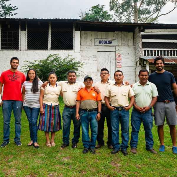 Carlos and Jorge with collaborators at the coffee farm